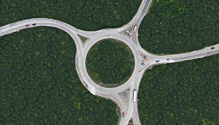 Cars approach roundabout